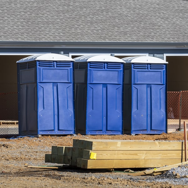 what is the cost difference between standard and deluxe porta potty rentals in Bruce MS